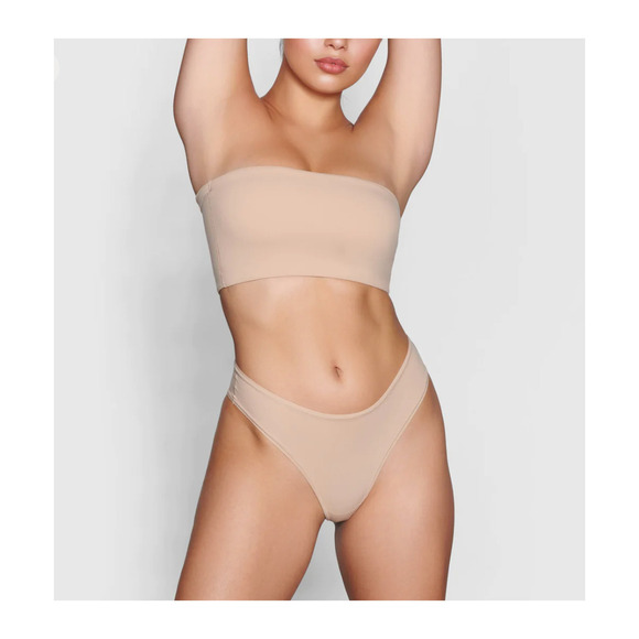 SKIMS Tan Seamless Bandeau Bra - Picture 1 of 7